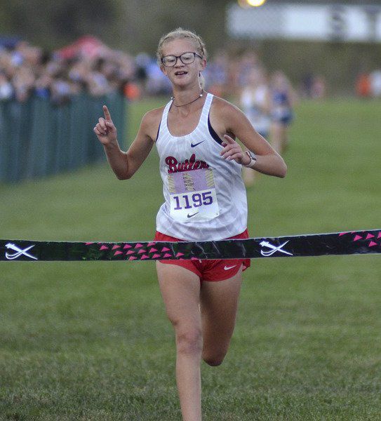 Cross country athletes enjoy running with lights on